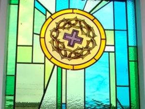 Maundy Thursday Cross with crown of thorns window at Martin Luther Church