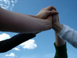 four hands together our vicars