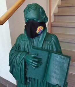 Martin Luther Statue with logo mask